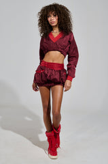 PUTTING IN WORK MINI BUBBLE SKIRT IN RED