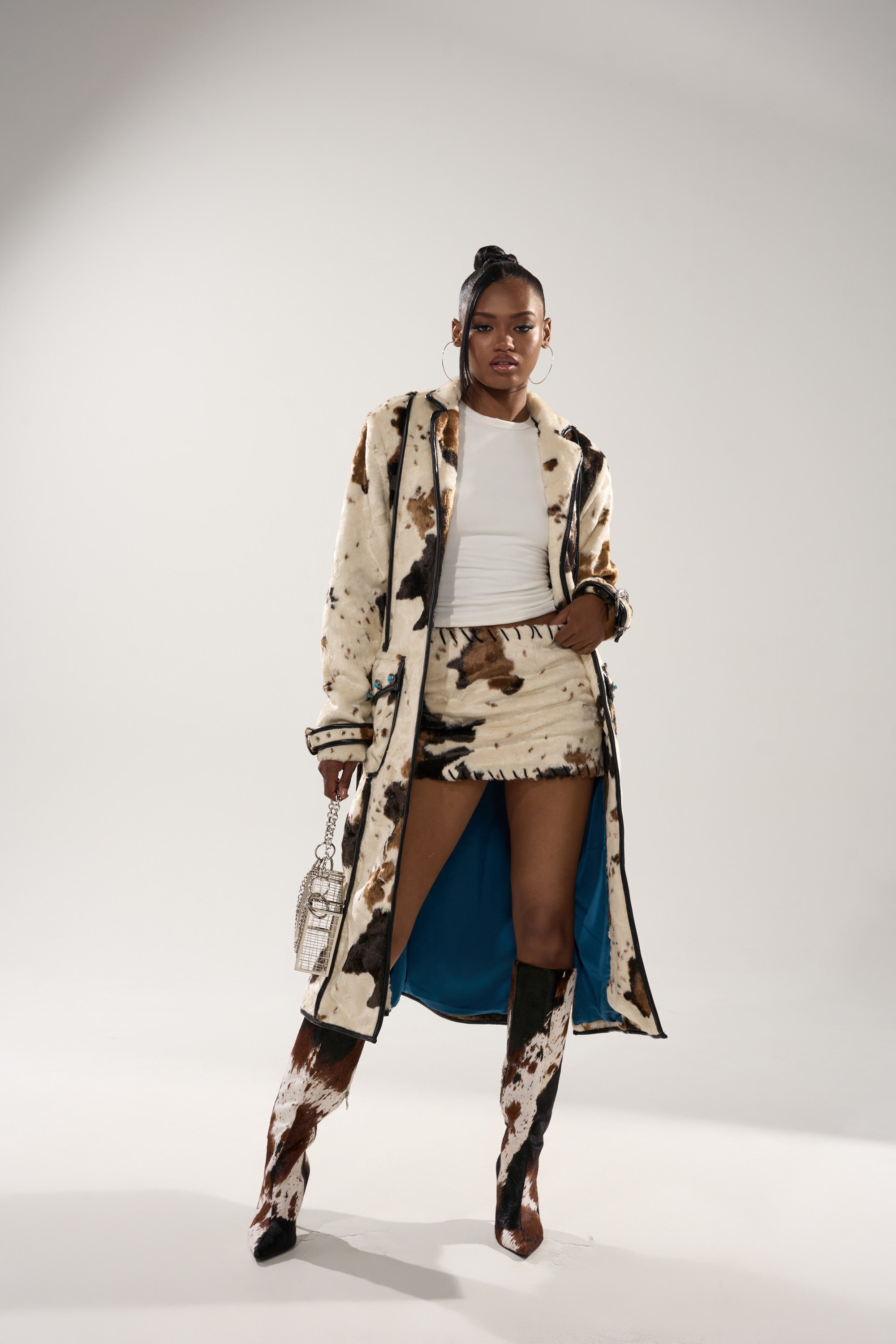 RIDE EM COW PRINT TRENCH