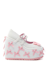 KOI FOOTWEAR A COURTSHIP OF BOWS PINK WEDGE SNEAKER