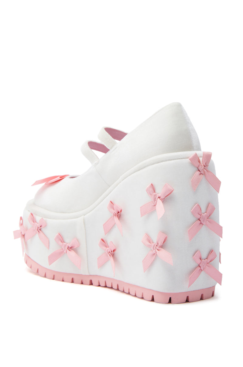 KOI FOOTWEAR A COURTSHIP OF BOWS PINK WEDGE SNEAKER