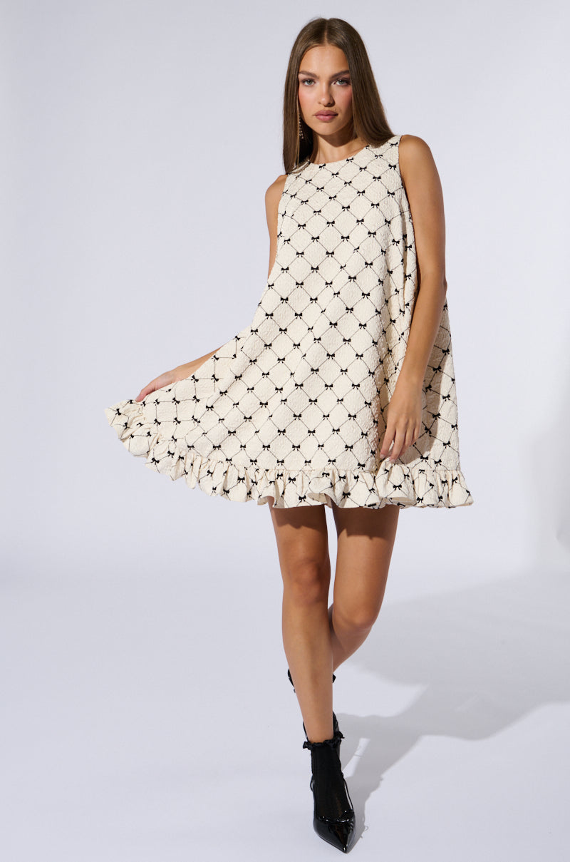 COVERED IN BOWS MINI DRESS