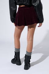 DONT LOOK BACK VELVET MINI SKIRT IN PURPLE